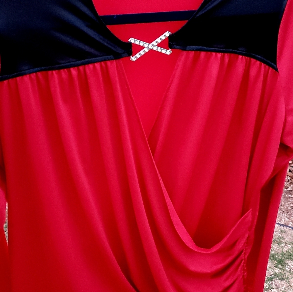 Gorgeous shirt with jewel clasp.